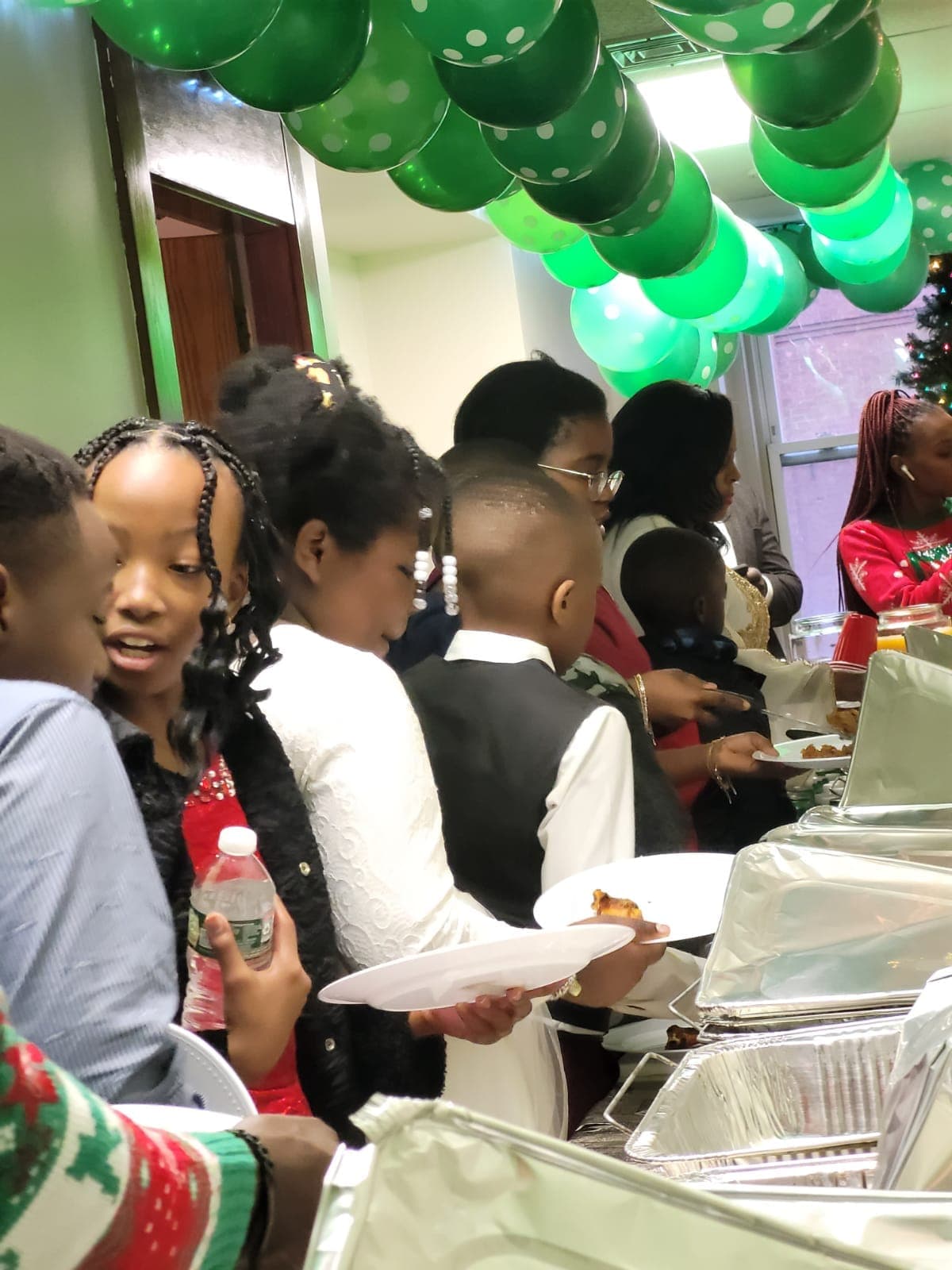 Families sharing a holiday fellowship meal