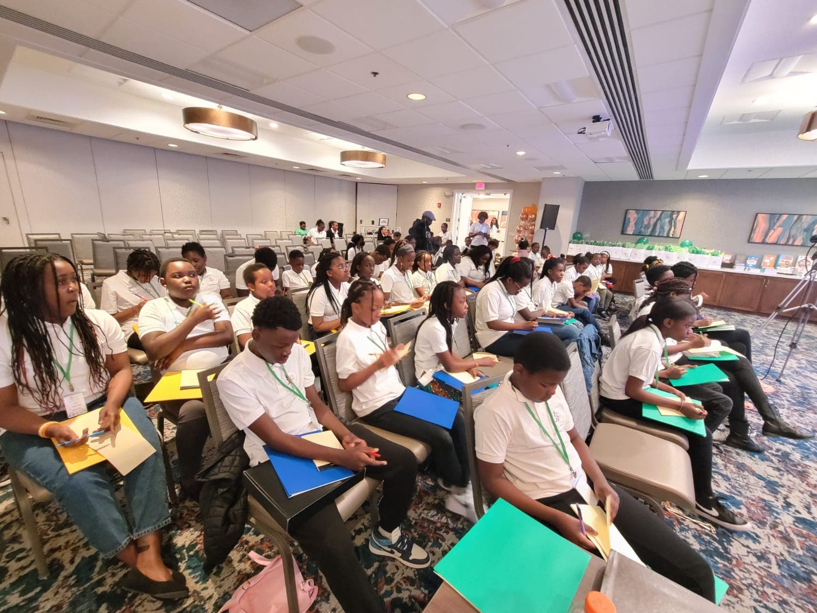 A room of young people taking part in a workshop